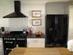 Kitchen with American style fridge